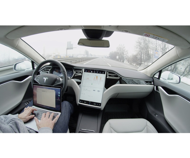 tesla self drive-dreamstime.jpg