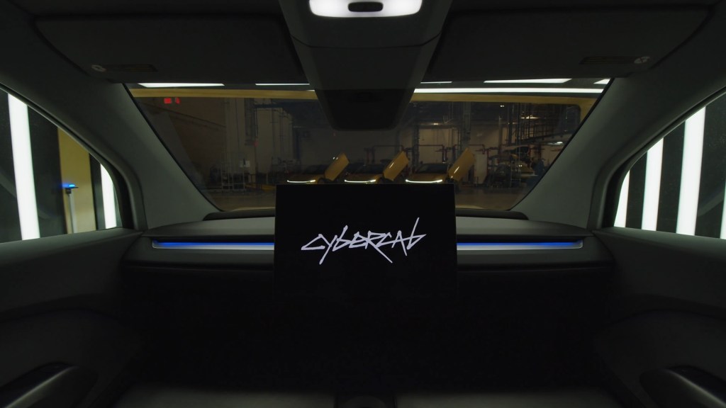 Interiorul și logoul Tesla CyberCab